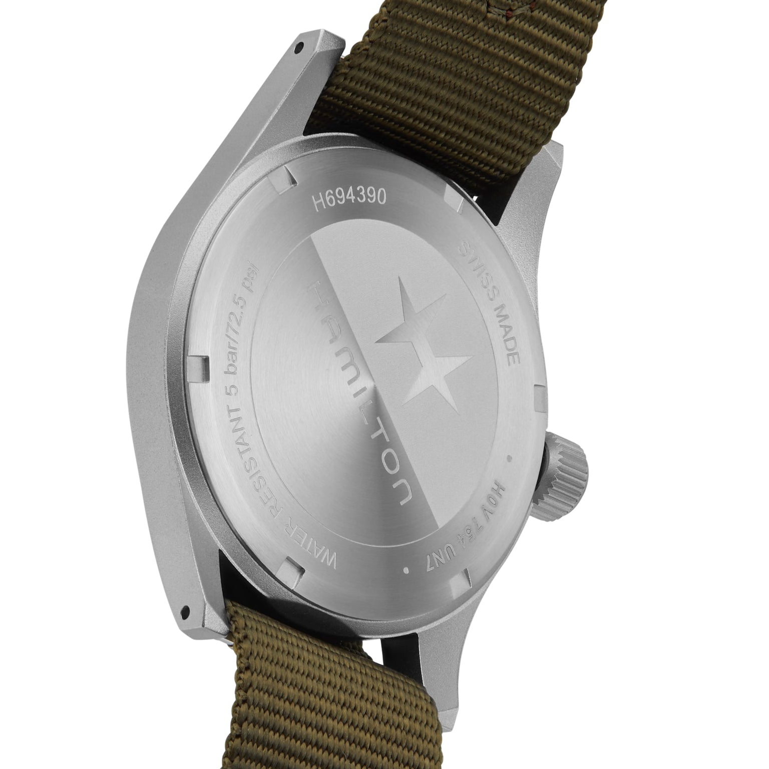 Close-up of the back of a Hamilton Khaki Field Mechanical watch, featuring engraved text and an olive green fabric strap.
