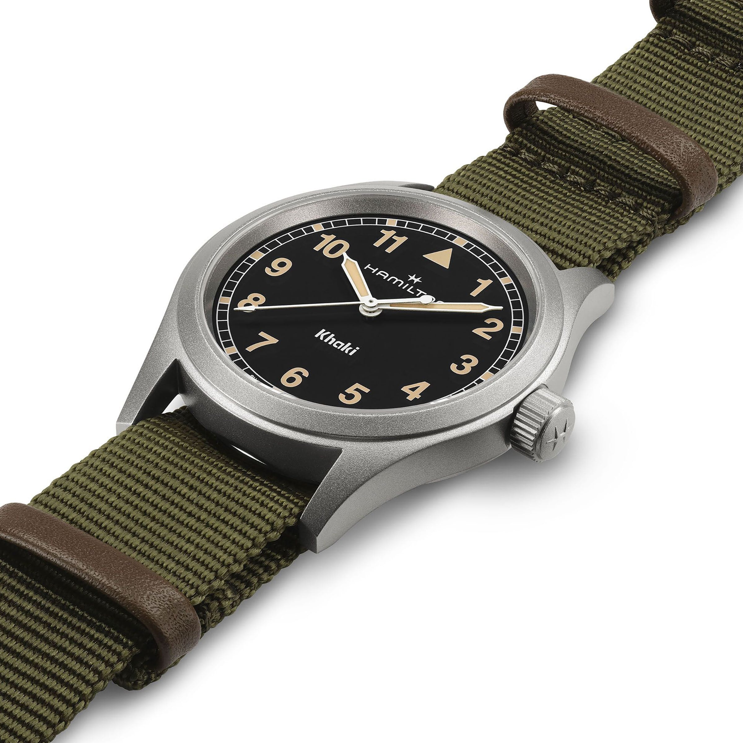 The Hamilton Khaki Field Quartz features a black dial with beige numerals and an olive green fabric strap accented by brown leather.