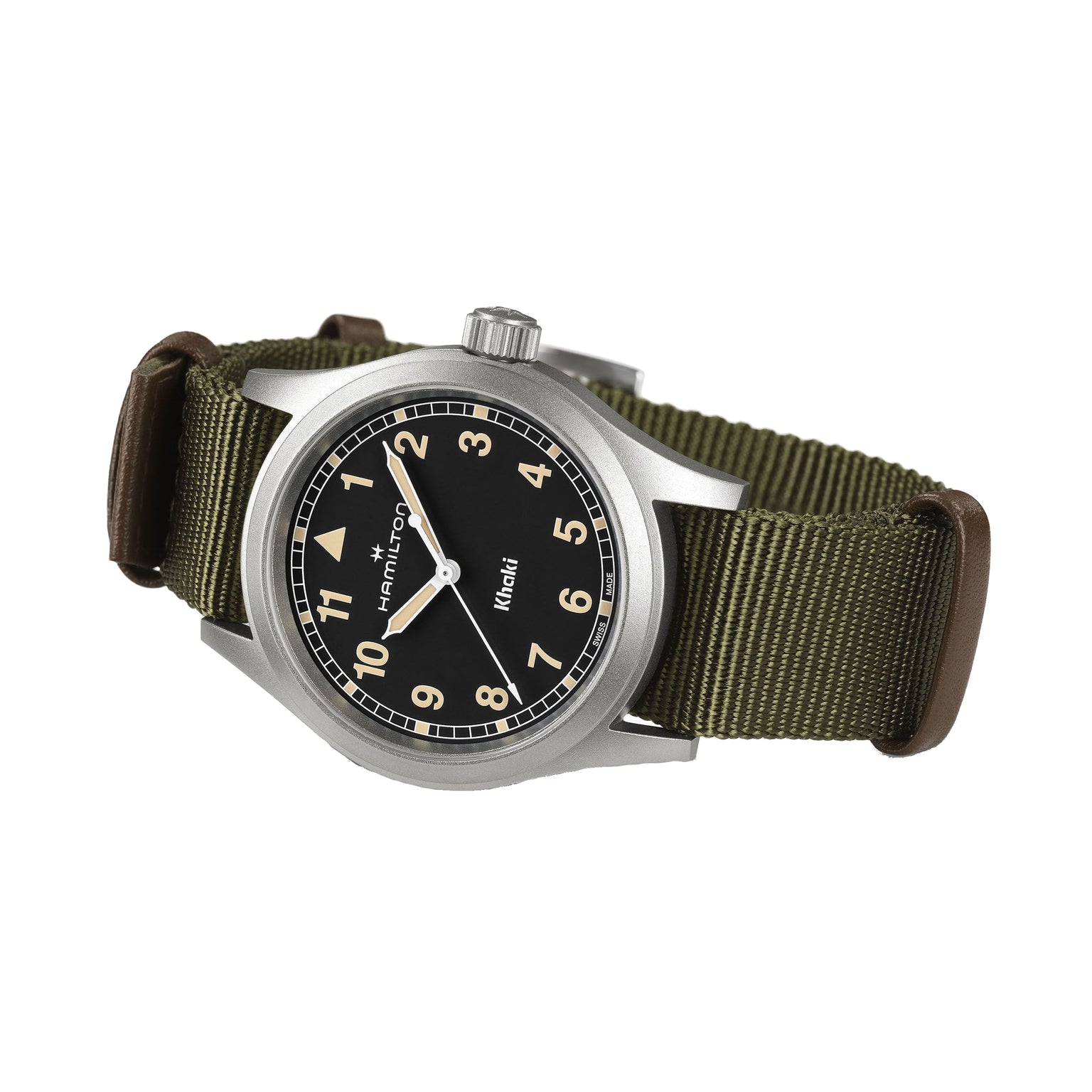 The Hamilton Khaki Field Quartz is a silver wristwatch with a black dial and olive green fabric strap, shown displaying the time 10:10.