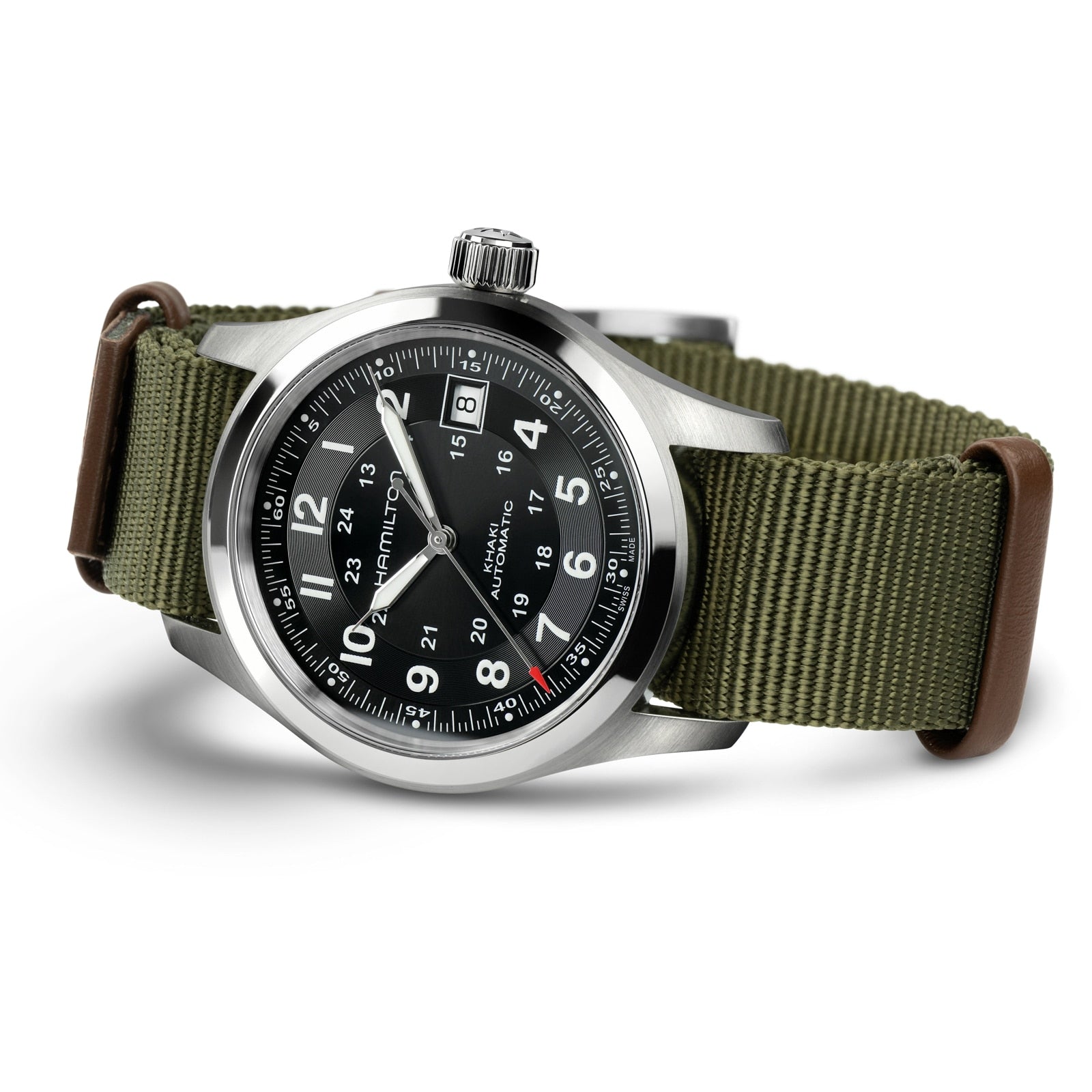 The Hamilton x Call of Duty Black Ops 7, a Swiss-made watch, features a stainless steel case, black dial with white numerals, and a green nylon strap with brown leather loops, shown angled on a white background.