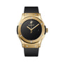 The Hublot Classic Fusion Original Yellow Gold features an 18K yellow gold case, black dial, black strap, silver bezel screws, HUB1110 automatic movement, and a date display at 3 o’clock.