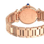 Rose gold Pasha de Cartier watch by Cartier pictured from the back, showcasing its engraved case, blue crown, and refined metal link bracelet.