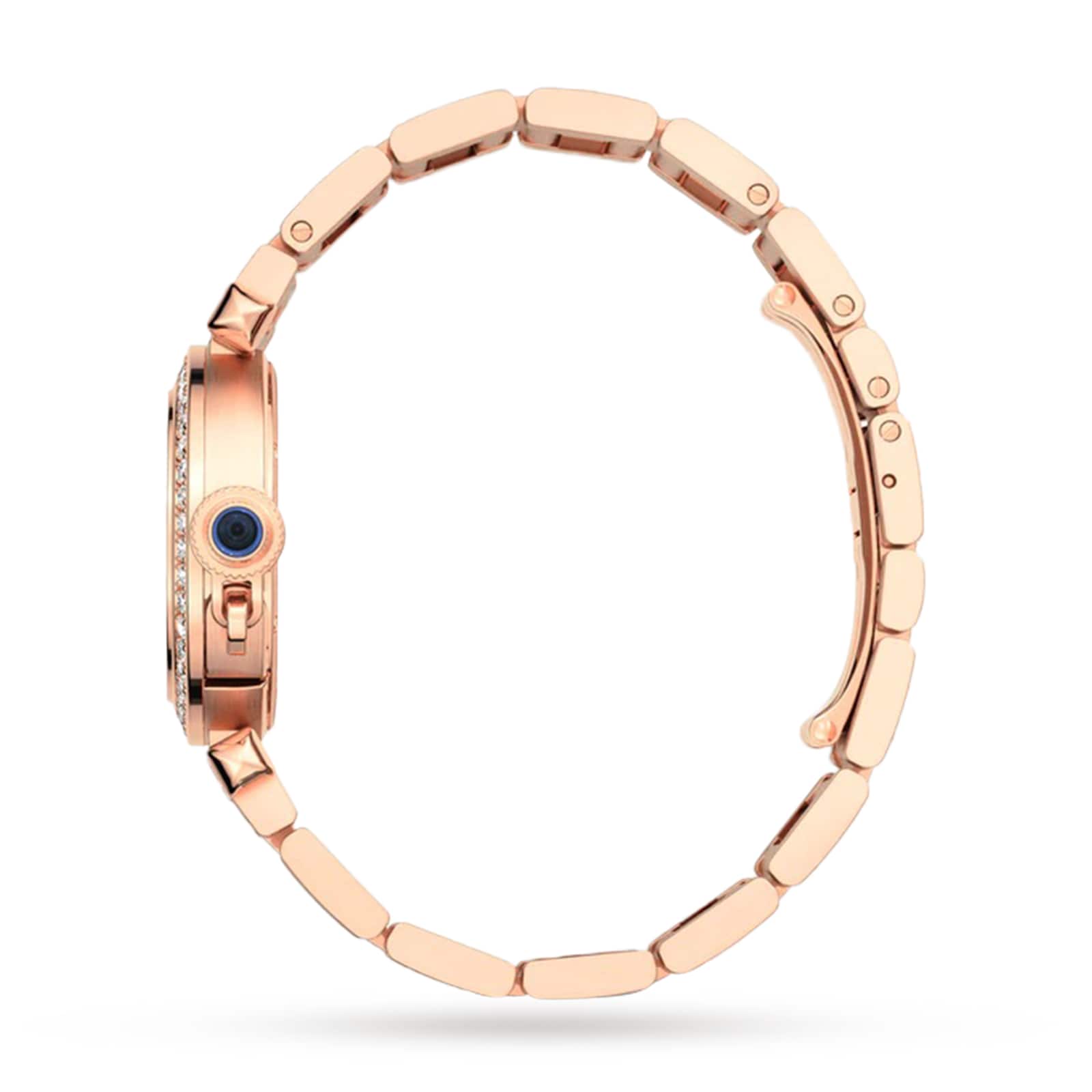 Side view of the Cartier Pasha de Cartier, a rose gold wristwatch with a round face, blue crown, and linked band.