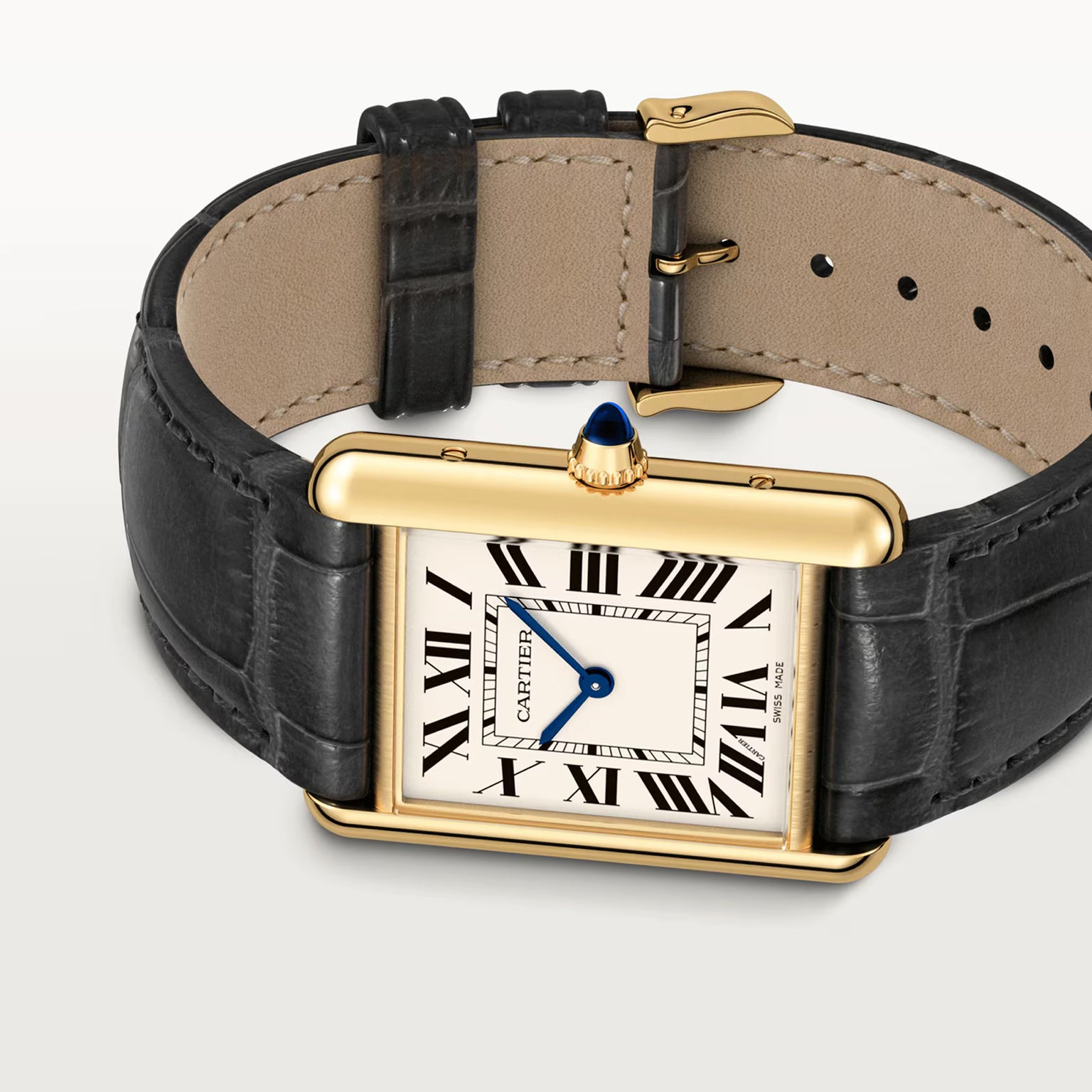 The Cartier Tank Louis Medium Model watch features a gold rectangular case, white dial with black Roman numerals, blue hands, and a black leather strap—an iconic design inspired by Louis Cartier.