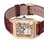The Cartier Santos-Dumont Skeleton with Micro-Rotor features a luxury skeleton design, rose gold case, brown leather strap, and striking blue hands.