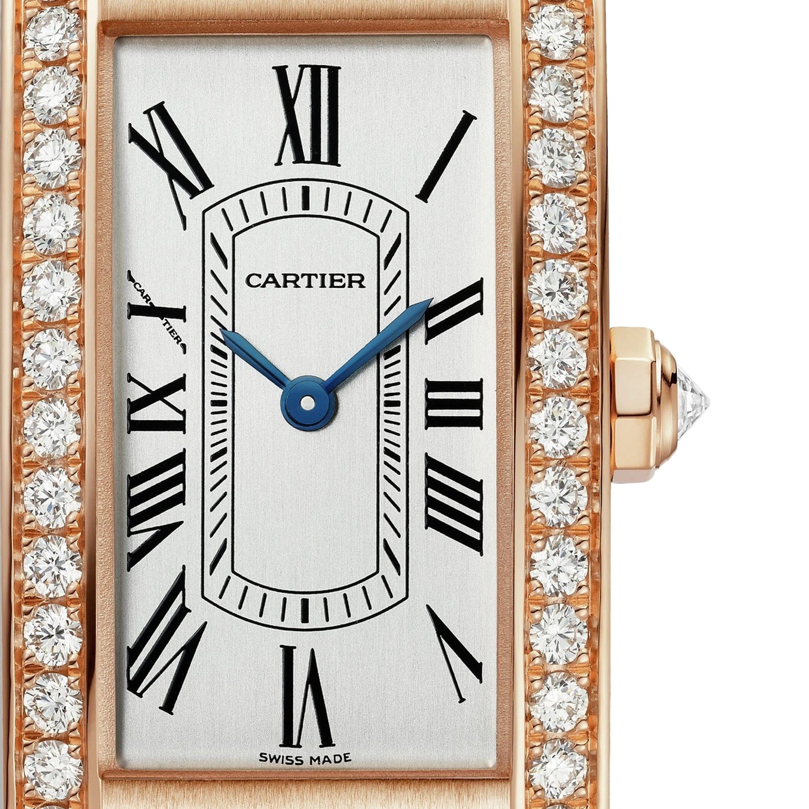 Close-up of the Cartier Tank Américaine watch featuring a rectangular face, rose gold case, diamond-encrusted bezel, Roman numeral markers, and blue hands.