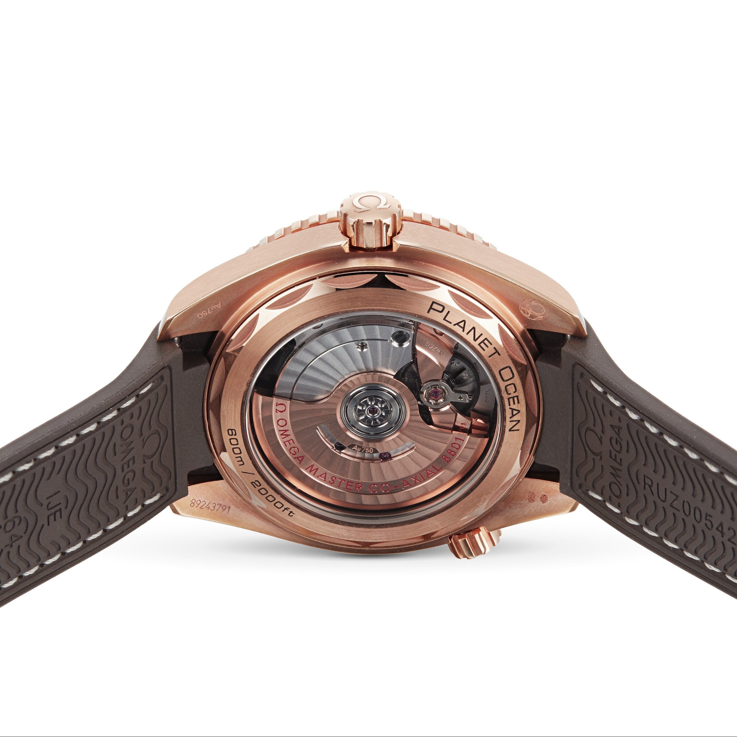 The back view of the OMEGA Seamaster Planet Ocean 600M showcases its exposed mechanical movement, brown rubber strap, and intricate engravings.
