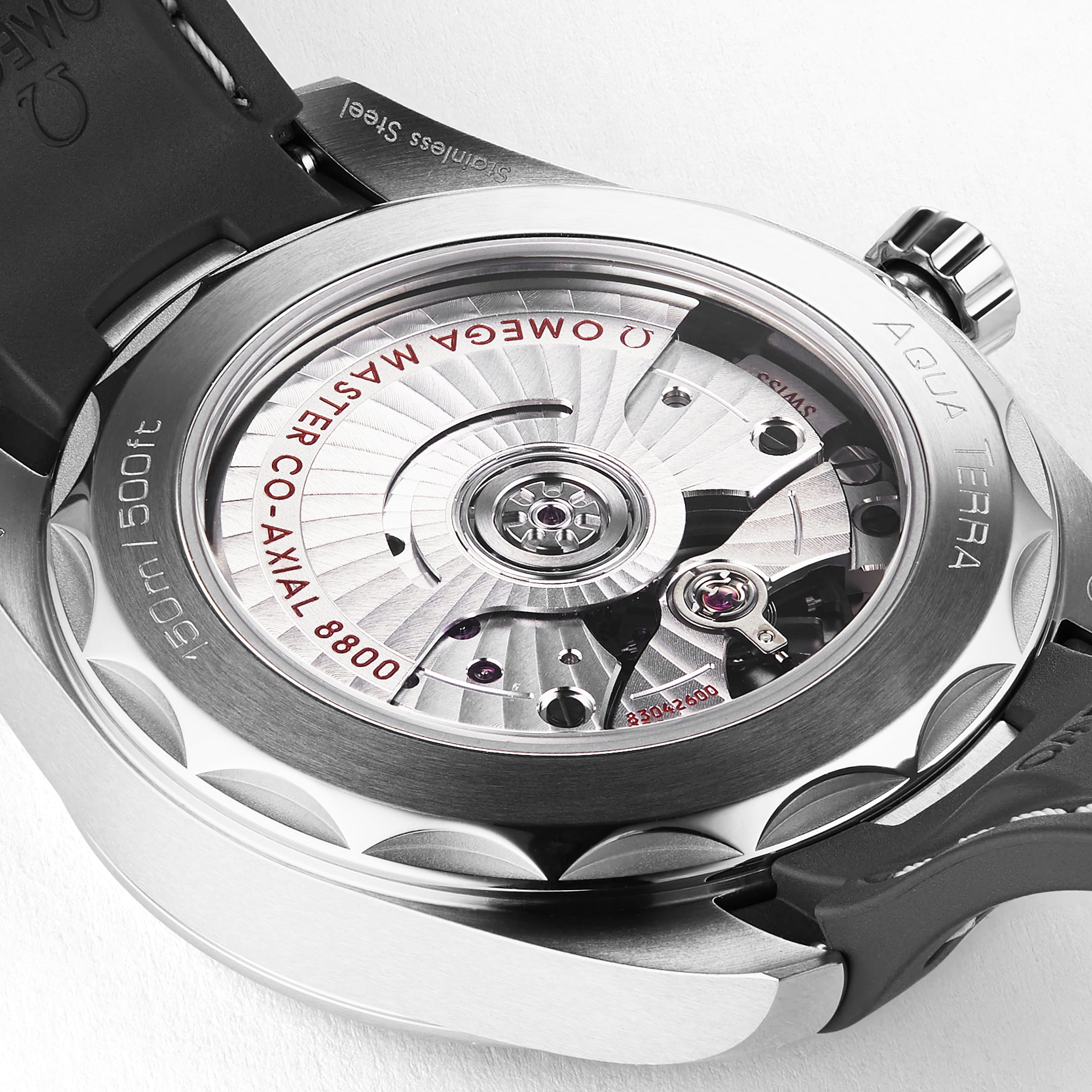 Close-up of the OMEGA Seamaster Aqua Terra 150M’s back, showcasing its Master Chronometer 8800 movement through a transparent caseback—a modern nod to Seamaster heritage and luxury sailboat inspiration.