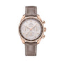 The OMEGA Speedmaster 38 chronograph features 18K Sedna™ gold, a grey alligator strap, silver dial with diamond bezel, three subdials, and a Co-Axial Calibre 3330 movement, displayed on a plain white background.