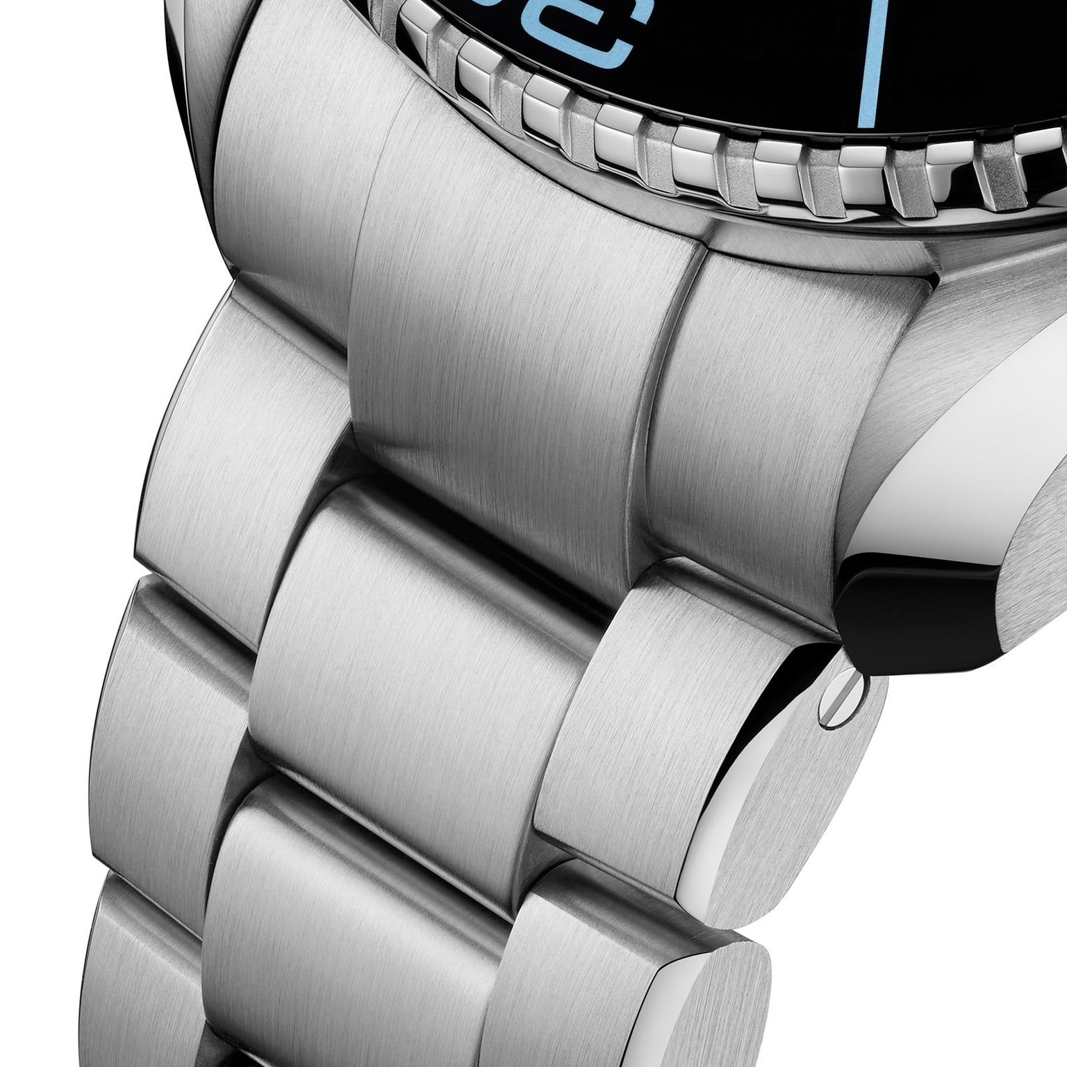Close-up of the OMEGA Seamaster Planet Ocean 6000Ms stainless steel bracelet and case, showcasing brushed metal links and a watch face with blue numerals—engineered for Ultra Deep saturation diving.