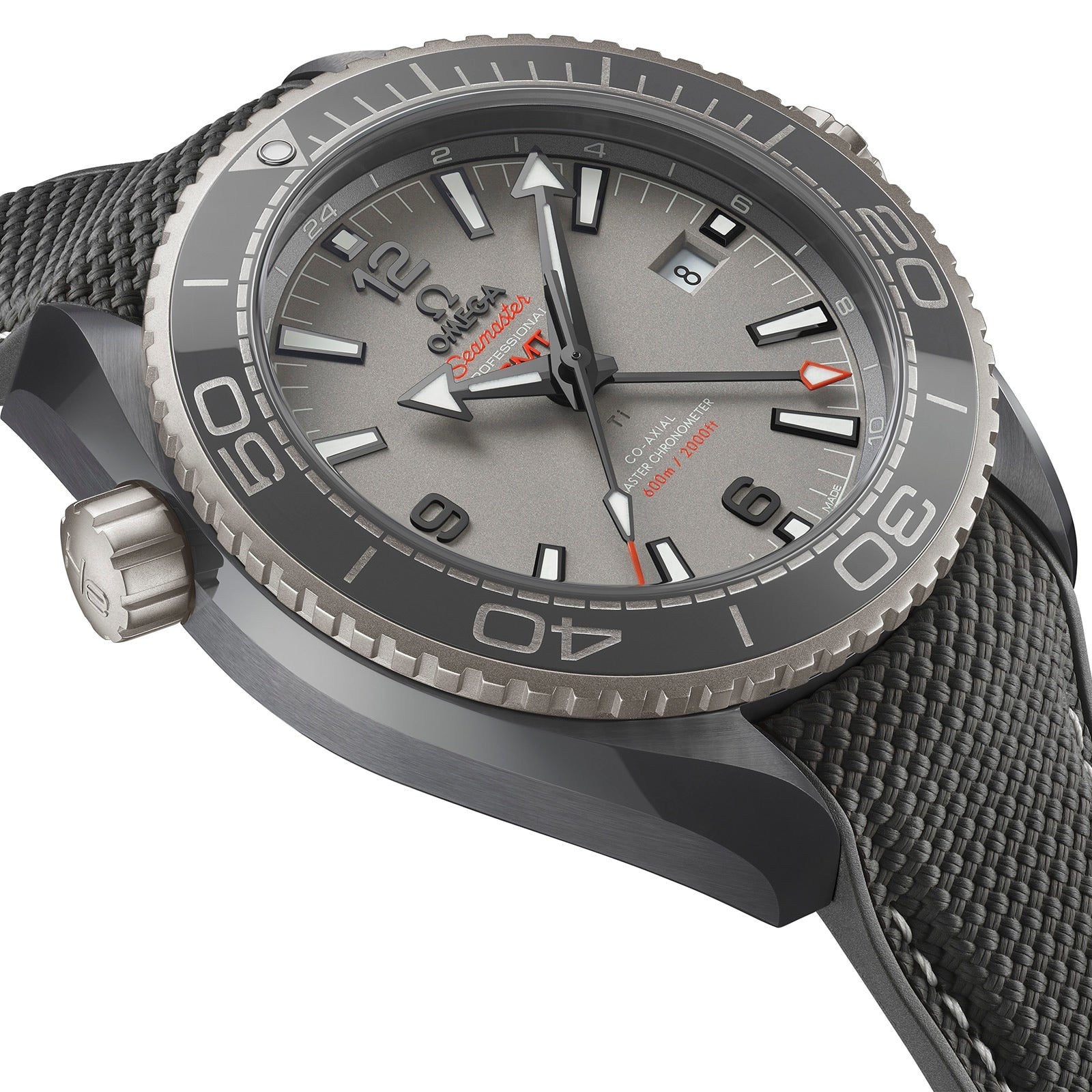 Close-up of the OMEGA Seamaster Planet Ocean 600M wristwatch featuring a textured grey dial, bold hour markers, black bezel, and grey fabric-patterned strap—highlighting its Master Chronometer-certified precision.