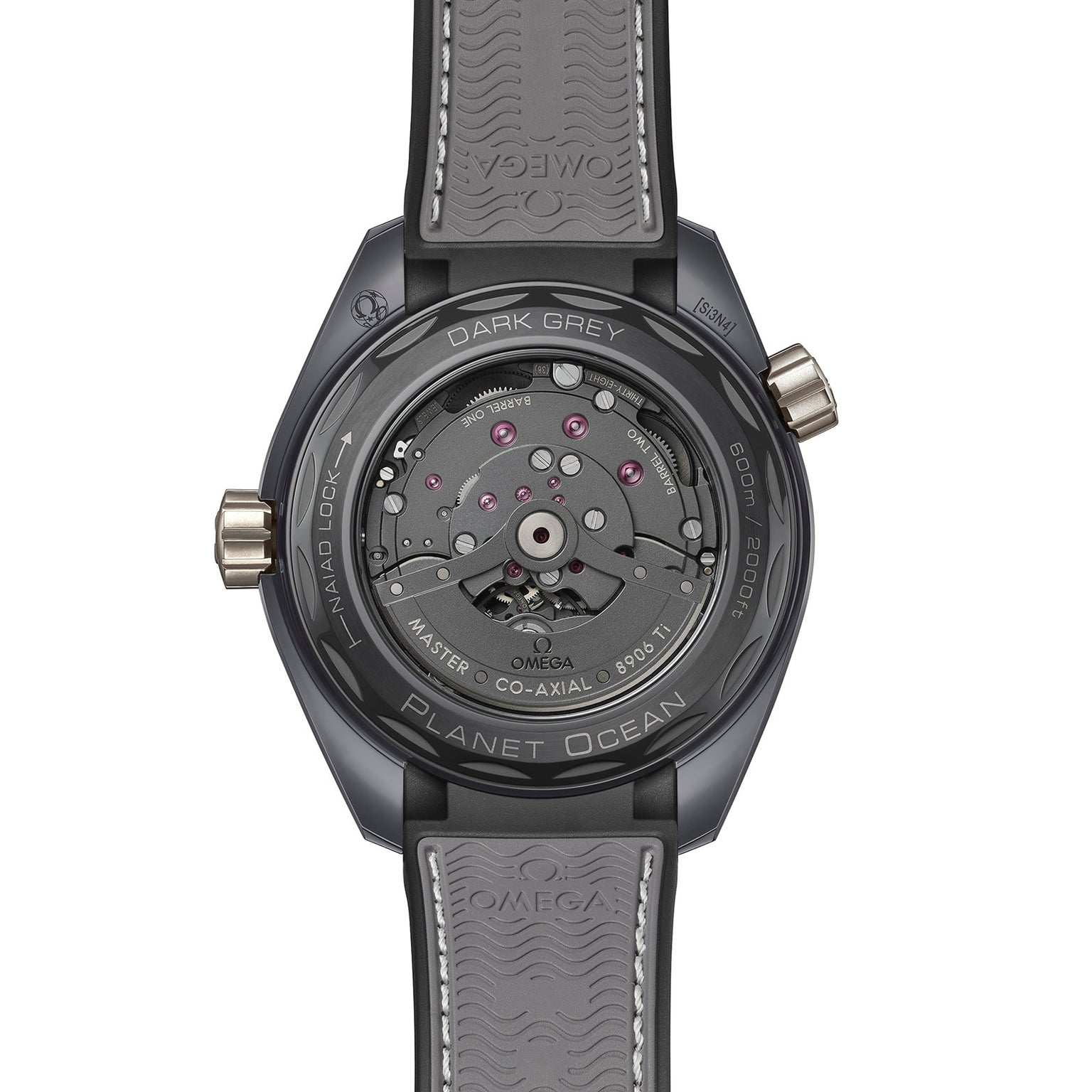 Back view of the OMEGA Seamaster Planet Ocean 600M showing its exposed Master Chronometer movement, detailed caseback inscriptions, and grey rubber strap with OMEGA branding.