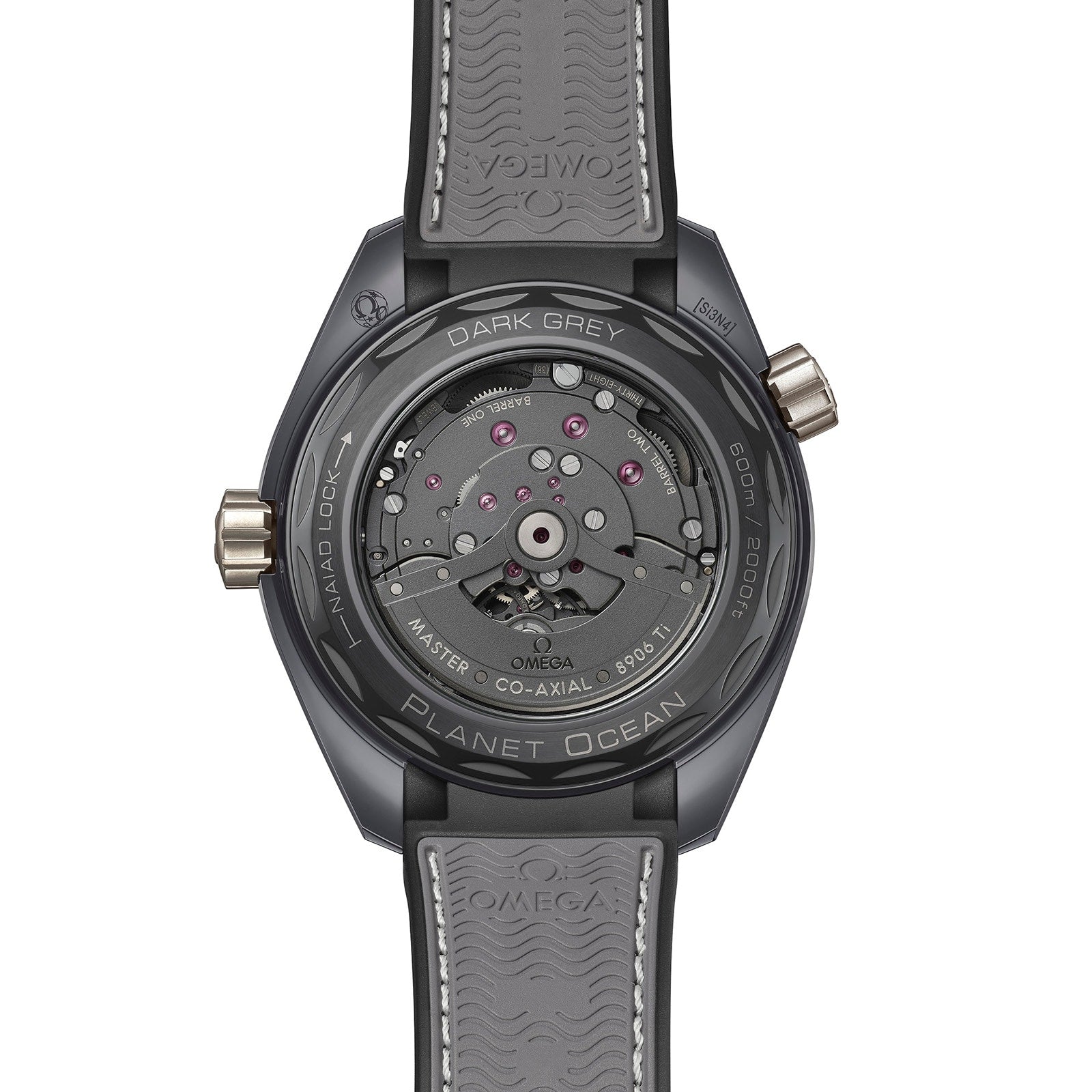 Back view of the OMEGA Seamaster Planet Ocean 600M showing its exposed Master Chronometer movement, detailed caseback inscriptions, and grey rubber strap with OMEGA branding.