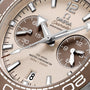 Close-up of the OMEGA Seamaster Planet Ocean 600M watch face, showing chronograph subdials, a date window, and text for 600m/2000ft water resistance and Co-Axial Master Chronometer.