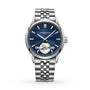 The Raymond Weil Freelancer Automatic Blue Dial Bracelet Watch features a blue dial, silver hour markers, and an exposed tourbillon above 6 o’clock, embodying urban style and the sophistication of fine mechanical watches.