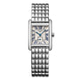 The Longines Mini DolceVita is a silver rectangular wristwatch with a metal link band, Roman numerals, blue hands, and a small seconds subdial—bringing modern sophistication to luxury timepieces.