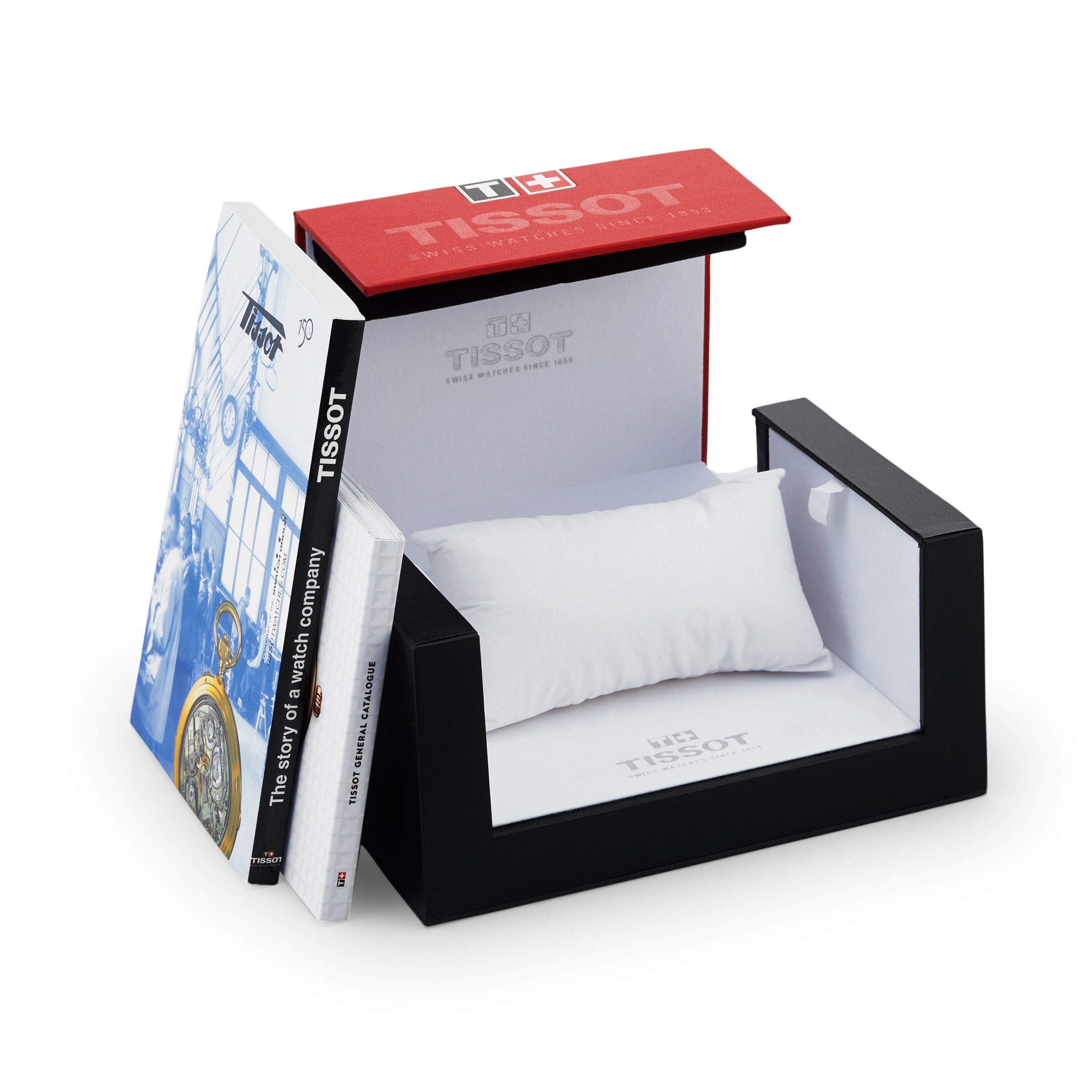 A miniature bed with a pillow, framed by a Tissot headboard and book bedposts, echoes the elegance of the Tissot T-Complication Squelette Mechanical—an imaginative boxed display inspired by luxury watchmaking.