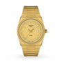 The Tissot PRX features a gold dial, gold hands and markers, date display at 3 oclock, and a gold metal bracelet. Powered by Swiss-made quartz movement for accuracy. Displayed on a white background.