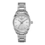 The Tissot PR 100 is a silver wristwatch featuring a metal band and a minimalist white dial with date display.
