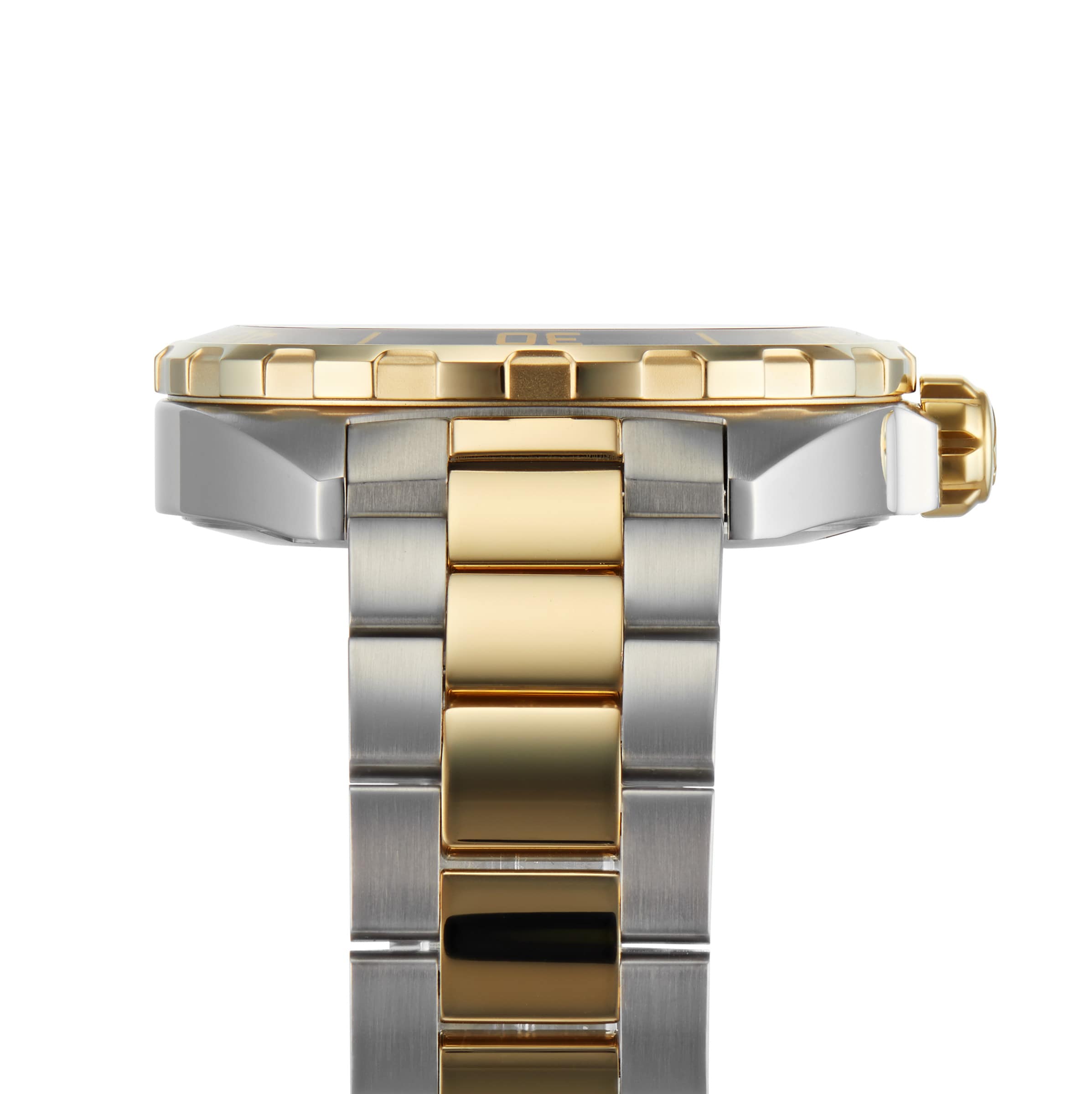 Close-up side view of the TAG Heuer Special Edition Formula 1 Date, featuring a two-tone gold and silver metal band, gold bezel, and an iconic design inspired by the Formula 1 series.