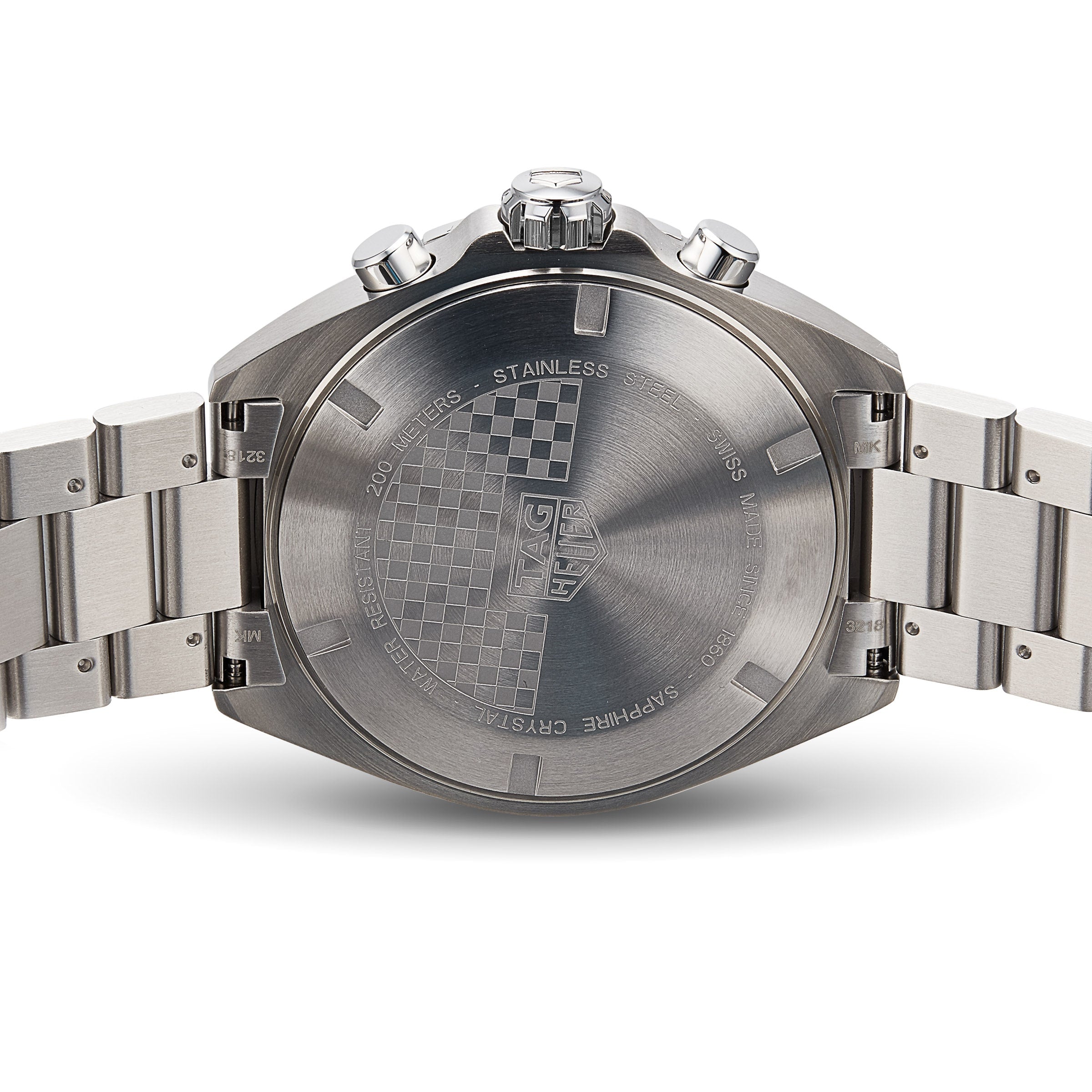 Close-up of the back of the TAG Heuer Formula 1 Chronograph, showing engraved branding, specifications, and a checkered pattern on its stainless steel case and bracelet.