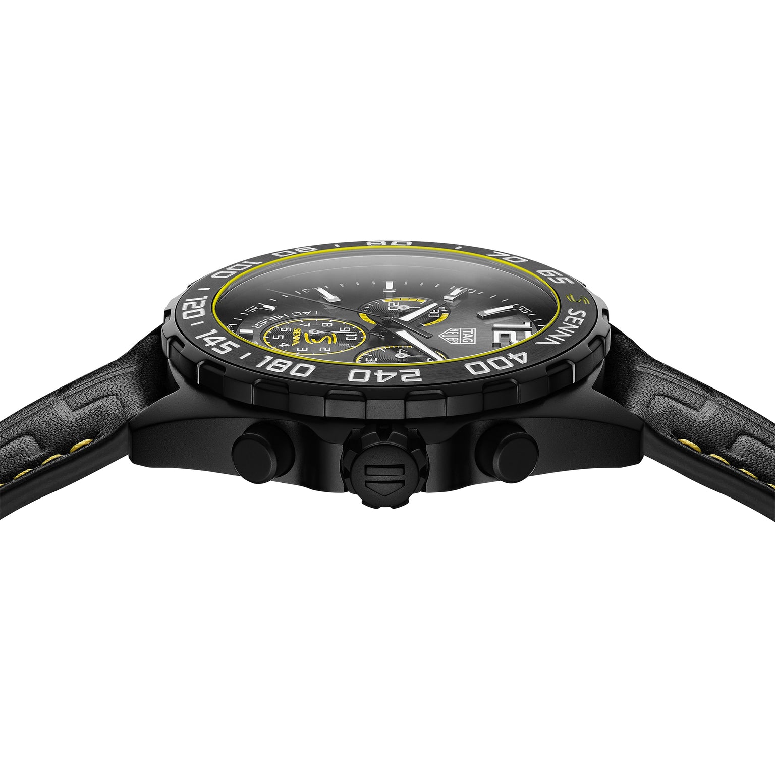 The TAG Heuer Special Edition Formula 1 Senna is a black sports watch featuring a textured strap, side buttons, and yellow accents on its bezel and dial.