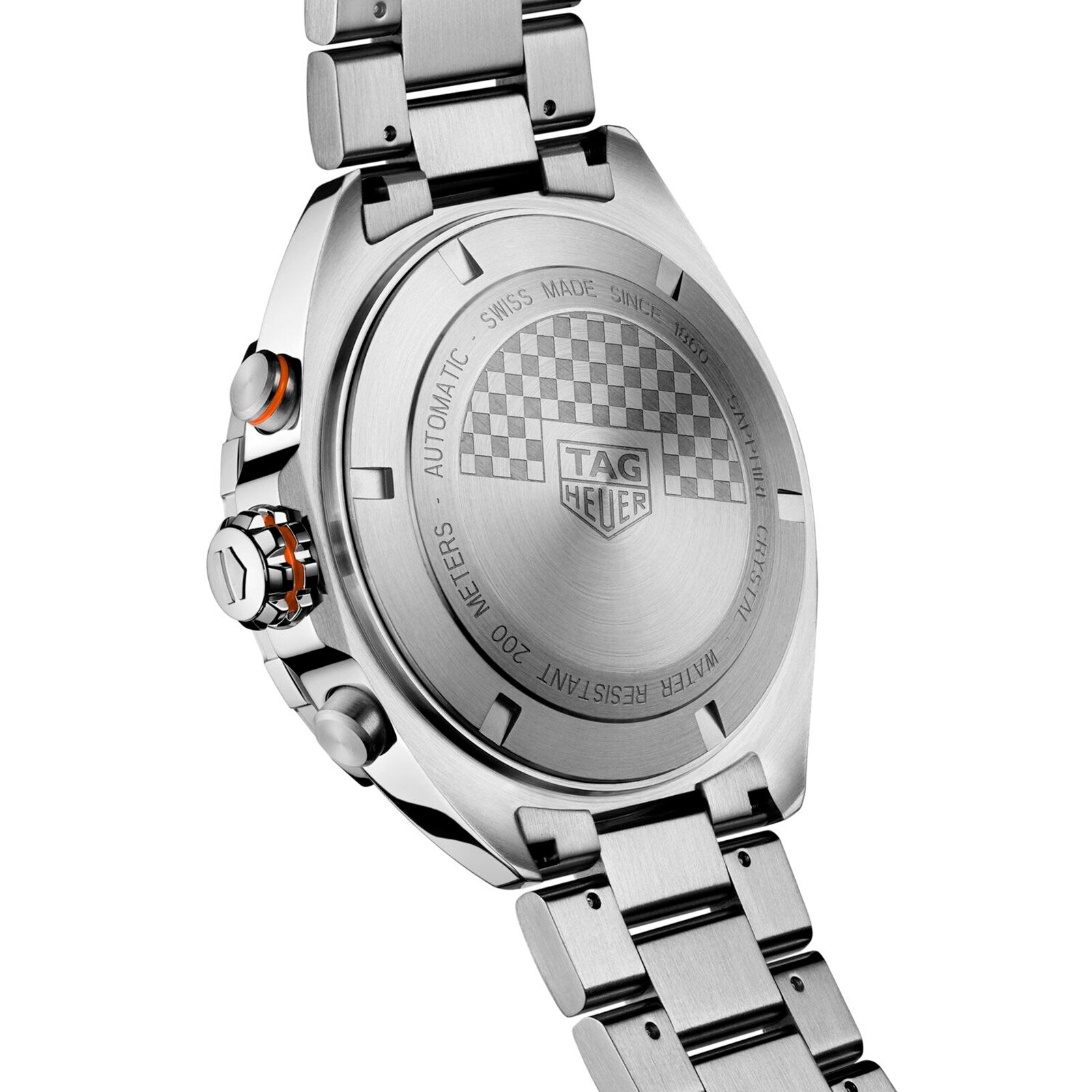 The back of a TAG Heuer Formula 1 Chronograph watch displays engraved branding, a checkered pattern, and Calibre 16 automatic movement details on its stainless steel case.