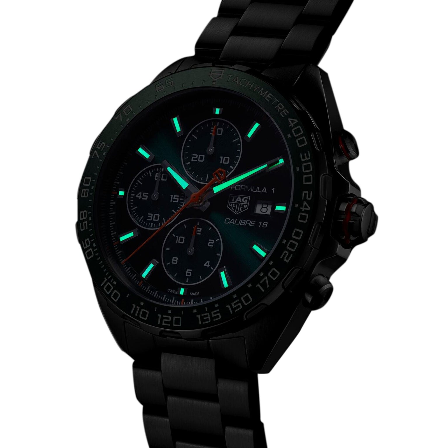 TAG Heuer Formula 1 Chronograph in low light with glowing hands and hour marks