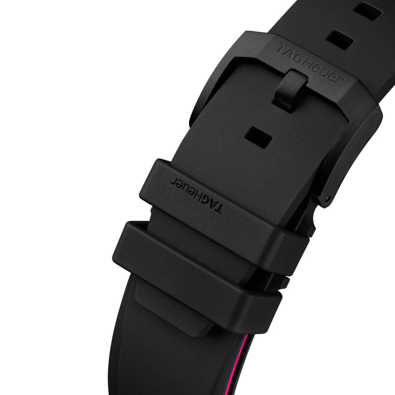 Close-up of a black rubber strap for the TAG Heuer Formula 1 Chronograph Limited Edition, featuring a matte black buckle and two loops. Both the strap and buckle display the TAG Heuer logo, highlighting its sporty motorsports-inspired design.