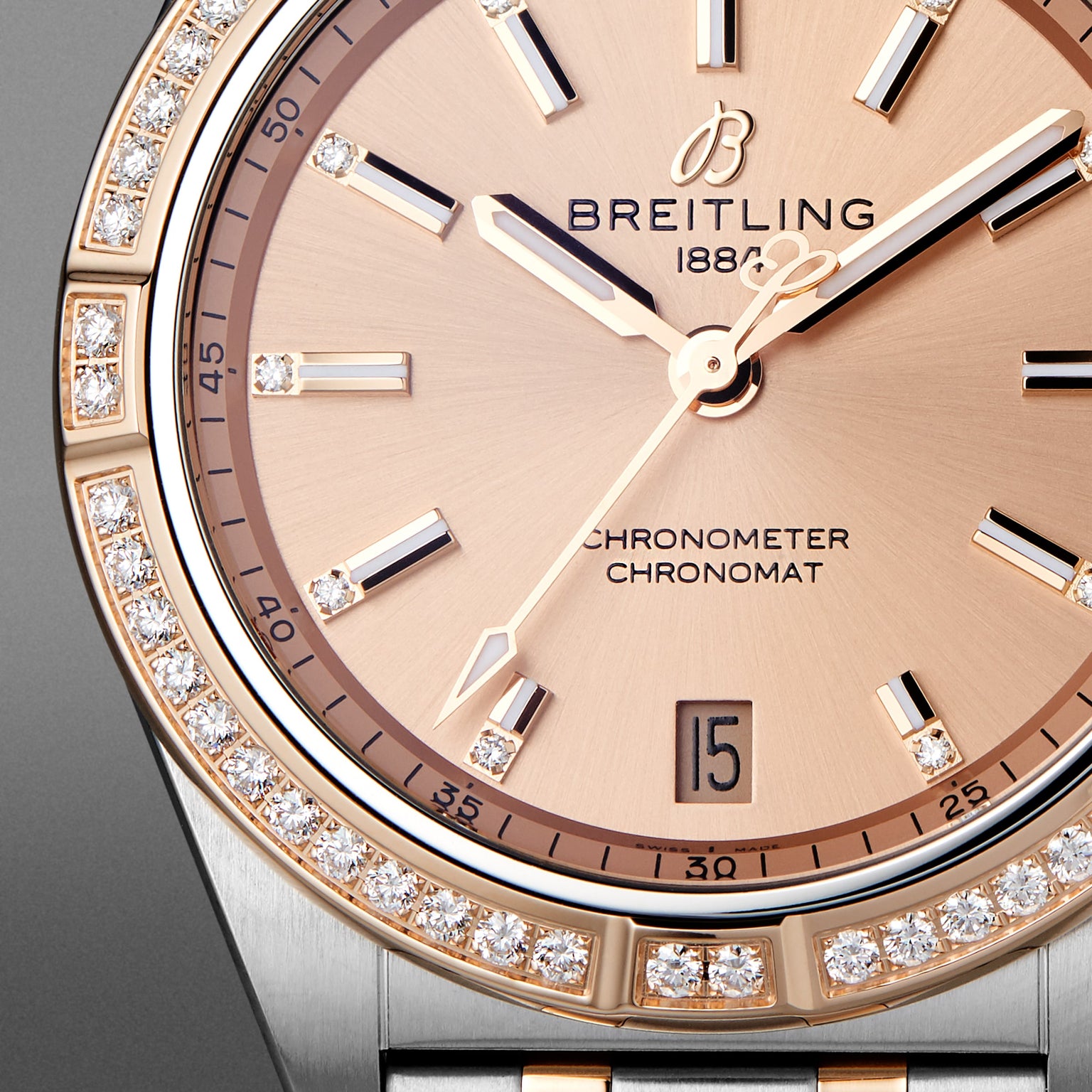 Close-up of the Breitling Chronomat Automatic 36 featuring a gold dial, diamond-set bezel, and date display at 6 o’clock. This COSC-certified chronometer combines elegance and precision.