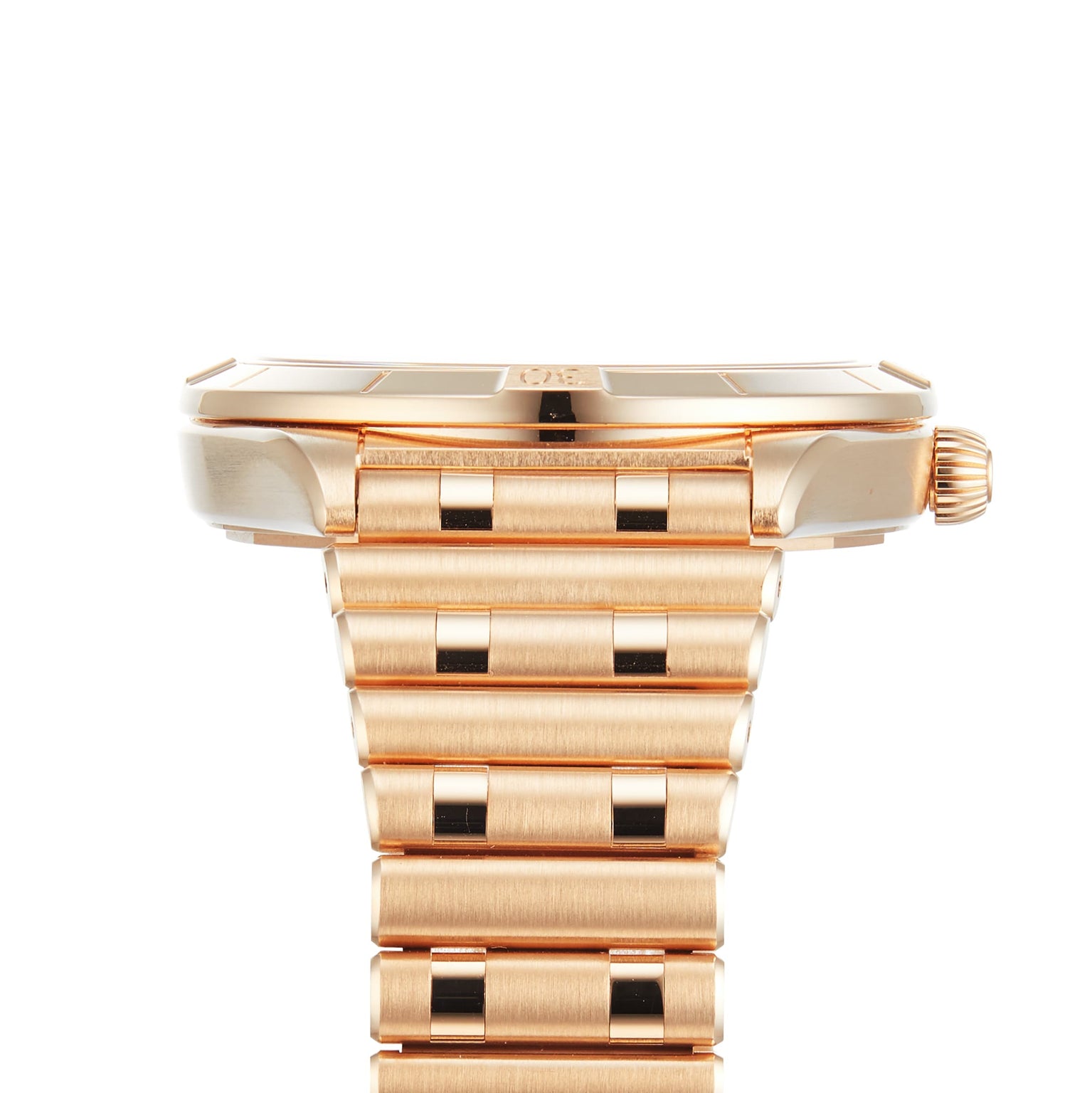 Close-up side view of the Breitling Chronomat Automatic 36, showcasing its gold Rouleaux bracelet and the watch face edge, set against a white background.