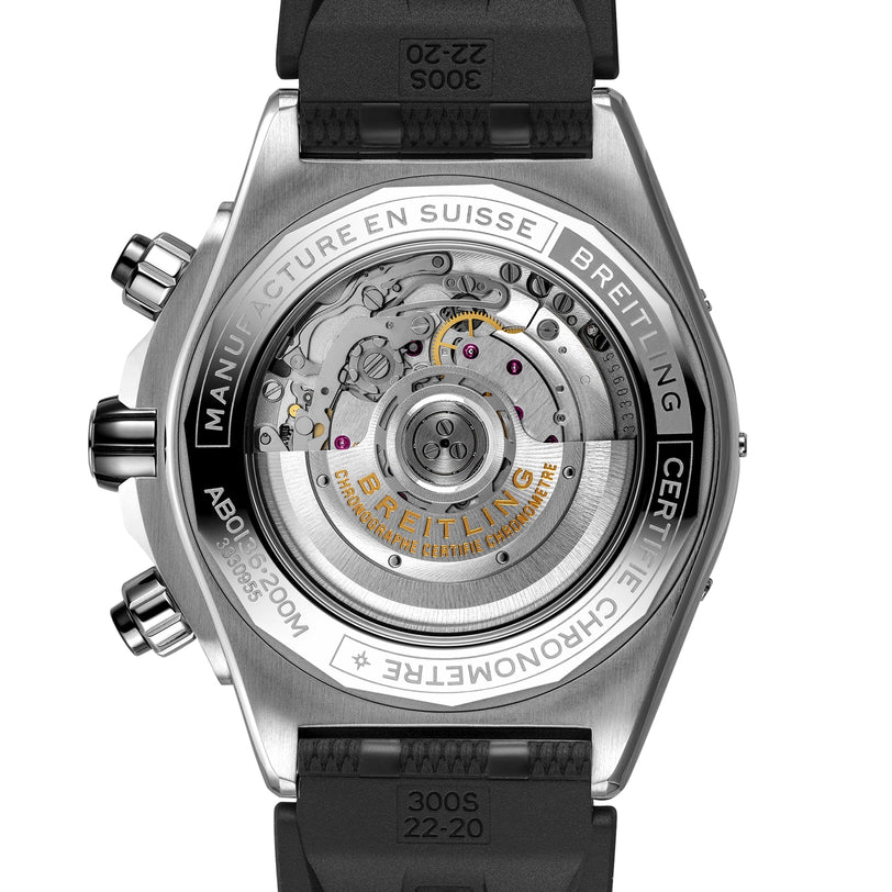 Close-up of the back of a Breitling Super Chronomat B01 44, featuring a Rouleaux bracelet, exposed Breitling 01 COSC-certified calibre, and engraved details on the stainless steel case.