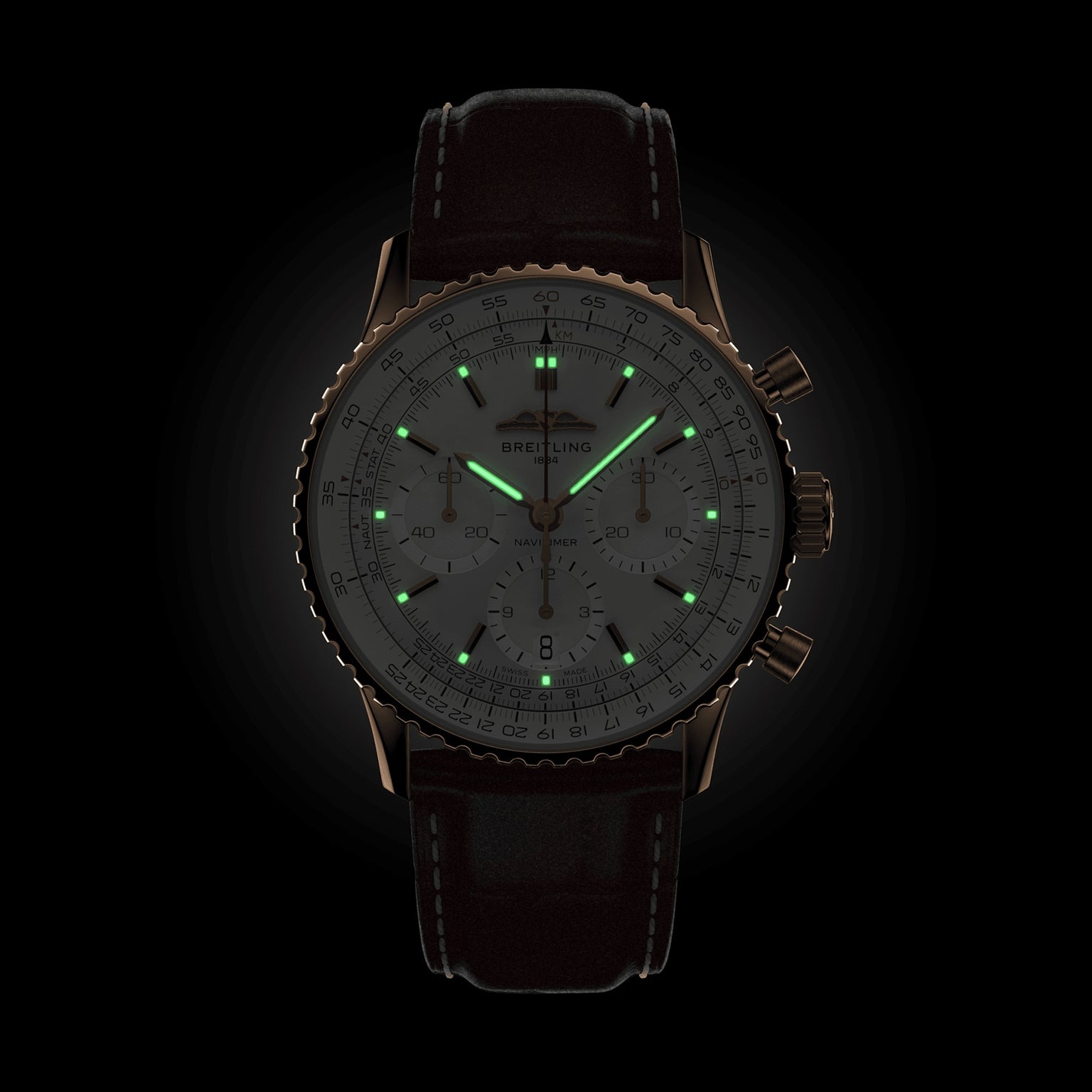 The Breitling Navitimer B01 Chronograph 41, featuring a dark leather strap and luminous green hour markers and hands, is displayed against a black background—an iconic pilot’s watch celebrated for precision and timeless style.