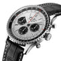 Close-up of the Breitling Navitimer B01 Chronograph 43, featuring a silver dial, black subdials, and a black leather strap with white stitching.