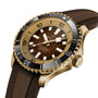 The Breitling Superocean Automatic 44 dive watch features a brown dial, bronze case, black bezel, and a brown textured rubber strap, displayed at an angle.