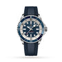 The Breitling Superocean Automatic 42 features a blue rubber strap, a blue and white dial, stainless steel case, rotating bezel, and is powered by the Breitling 17 calibre, shown on a white background.