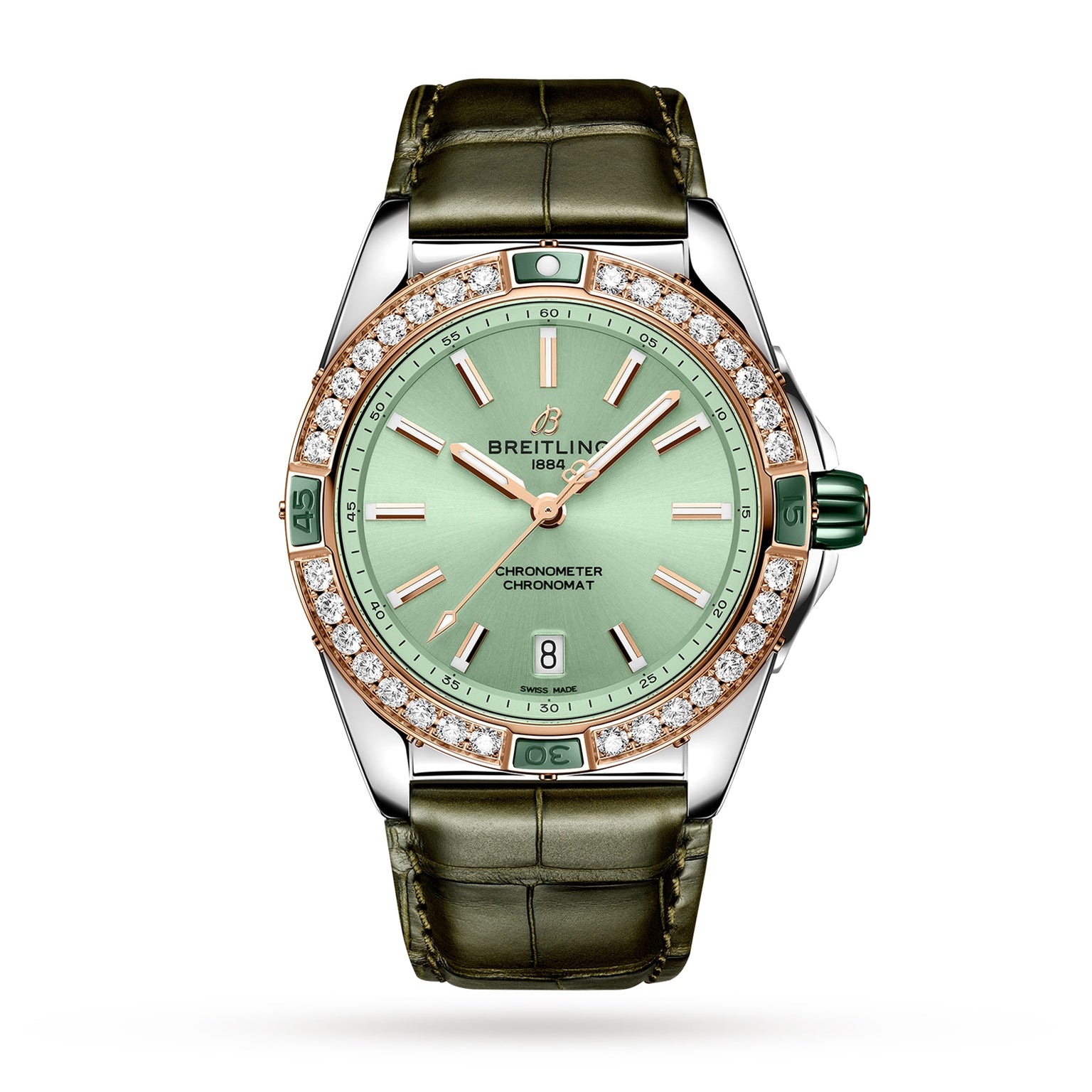 The Breitling Super Chronomat Automatic 38 features a green leather strap, green dial, gold hour markers, diamond bezel, date at 6 o’clock, and runs on the Breitling 17 calibre movement, shown against a white background.
