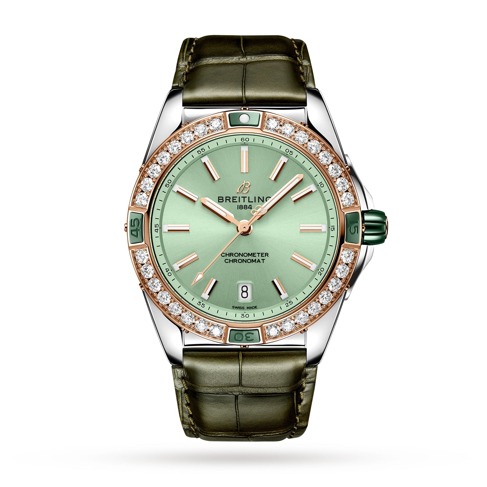 The Breitling Super Chronomat Automatic 38 features a green leather strap, green dial, gold hour markers, diamond bezel, date at 6 o’clock, and runs on the Breitling 17 calibre movement, shown against a white background.