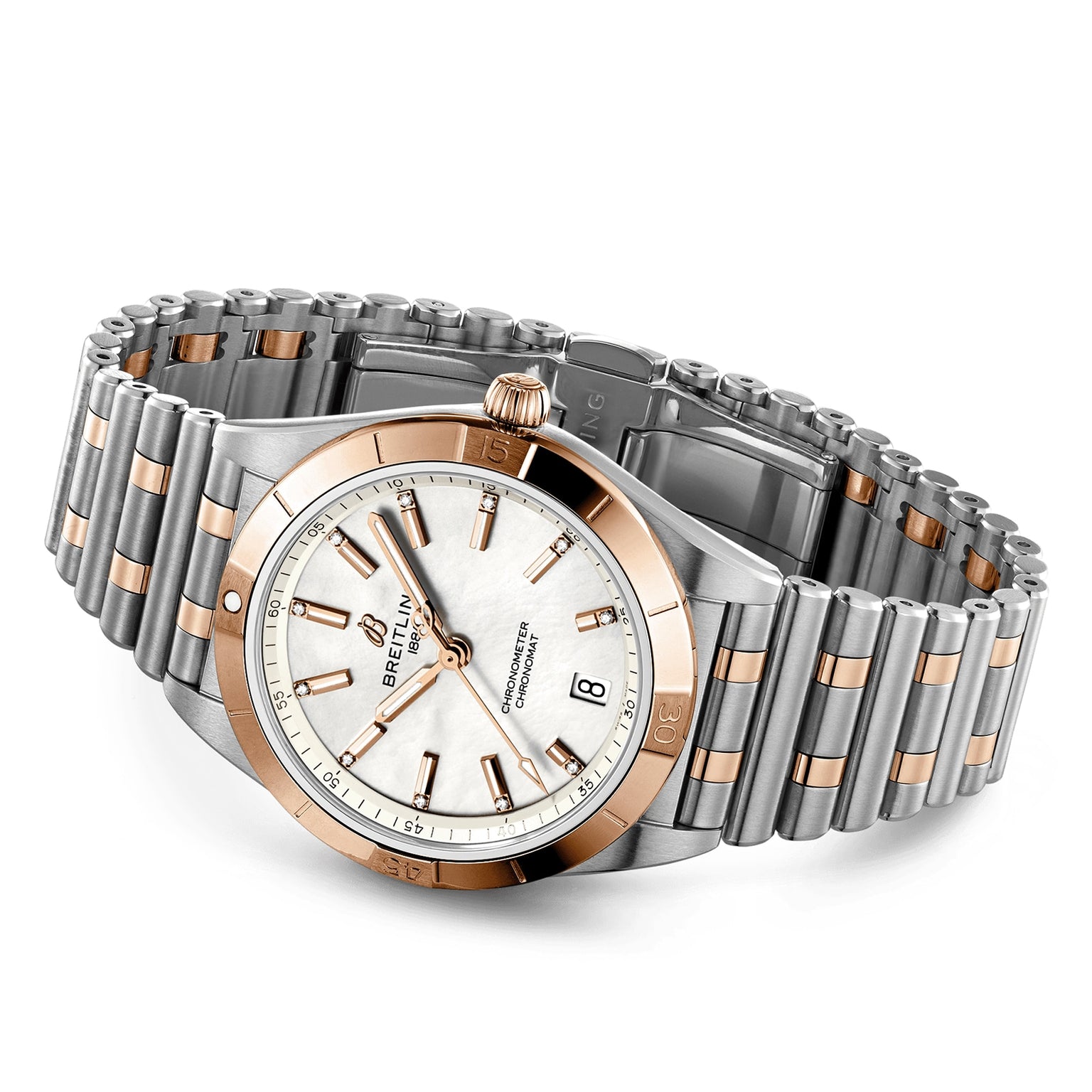 The Breitling Chronomat Automatic 36 features a silver and rose gold case, metal link band, white dial with date at 6 o’clock, gold-tone hands, and diamond-set hour markers.
