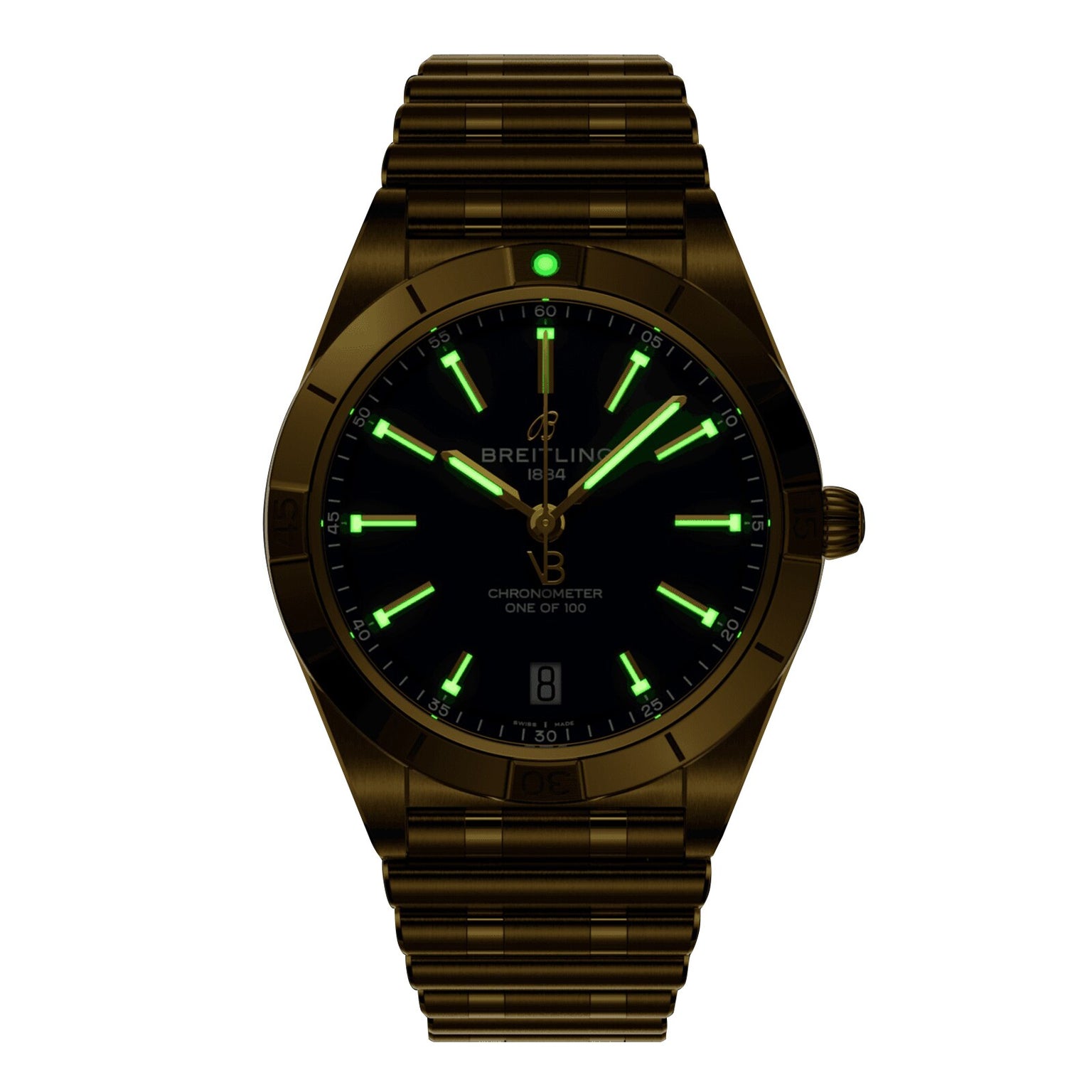 The Breitling Chronomat Automatic 36 Victoria Beckham features a metal band, black dial, luminous green markers and hands, and a date display at 6 o’clock, shown here in low light.