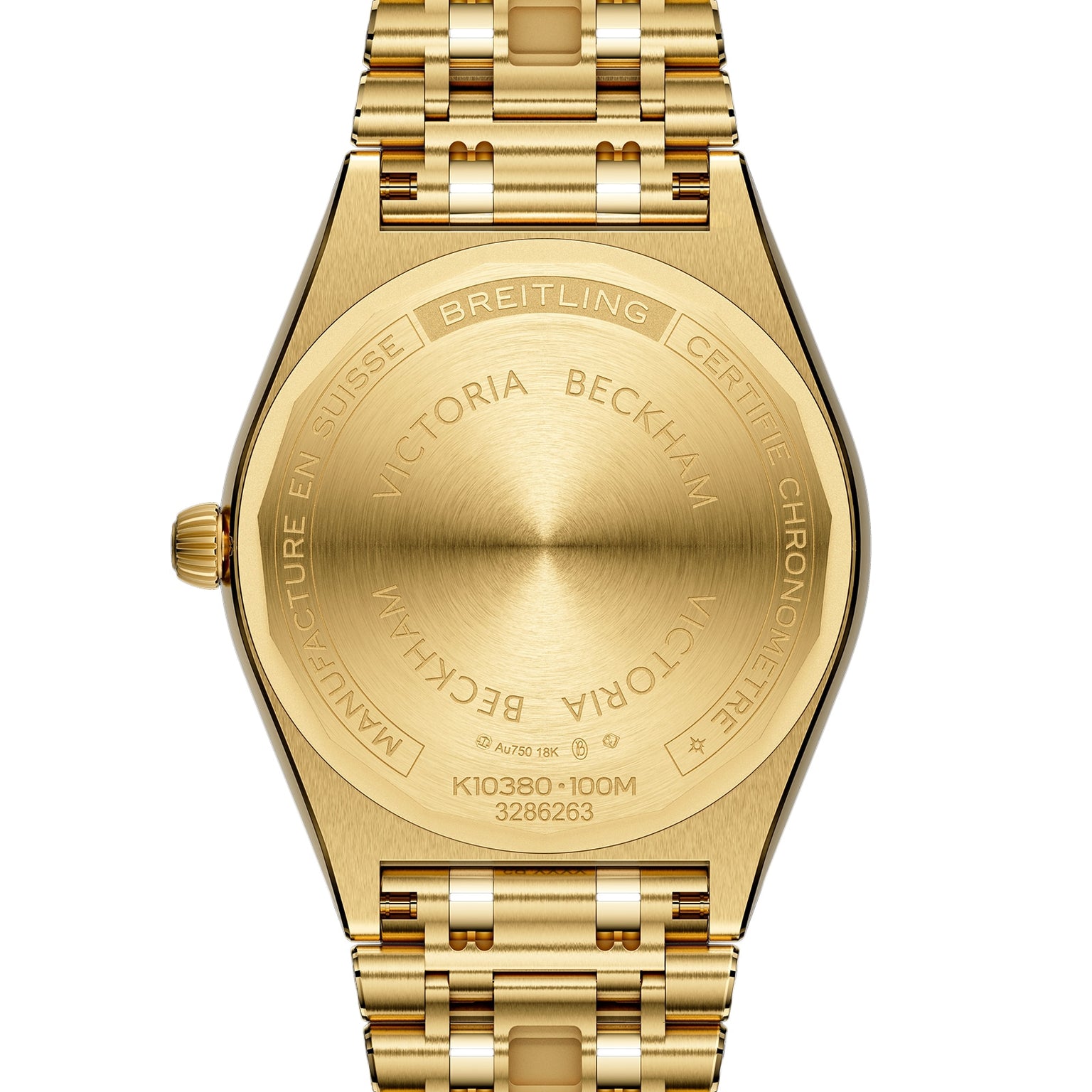 Close-up of the back of a Breitling Chronomat Automatic 36 Victoria Beckham watch in 18K yellow gold, engraved with collaboration details and official branding.