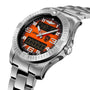 The Breitling Aerospace B70 Orbiter is a stainless steel pilot’s chronograph with an orange dial, white numerals, digital displays, aviation-themed insignia, and a metal link band, powered by the Manufacture Calibre B70.