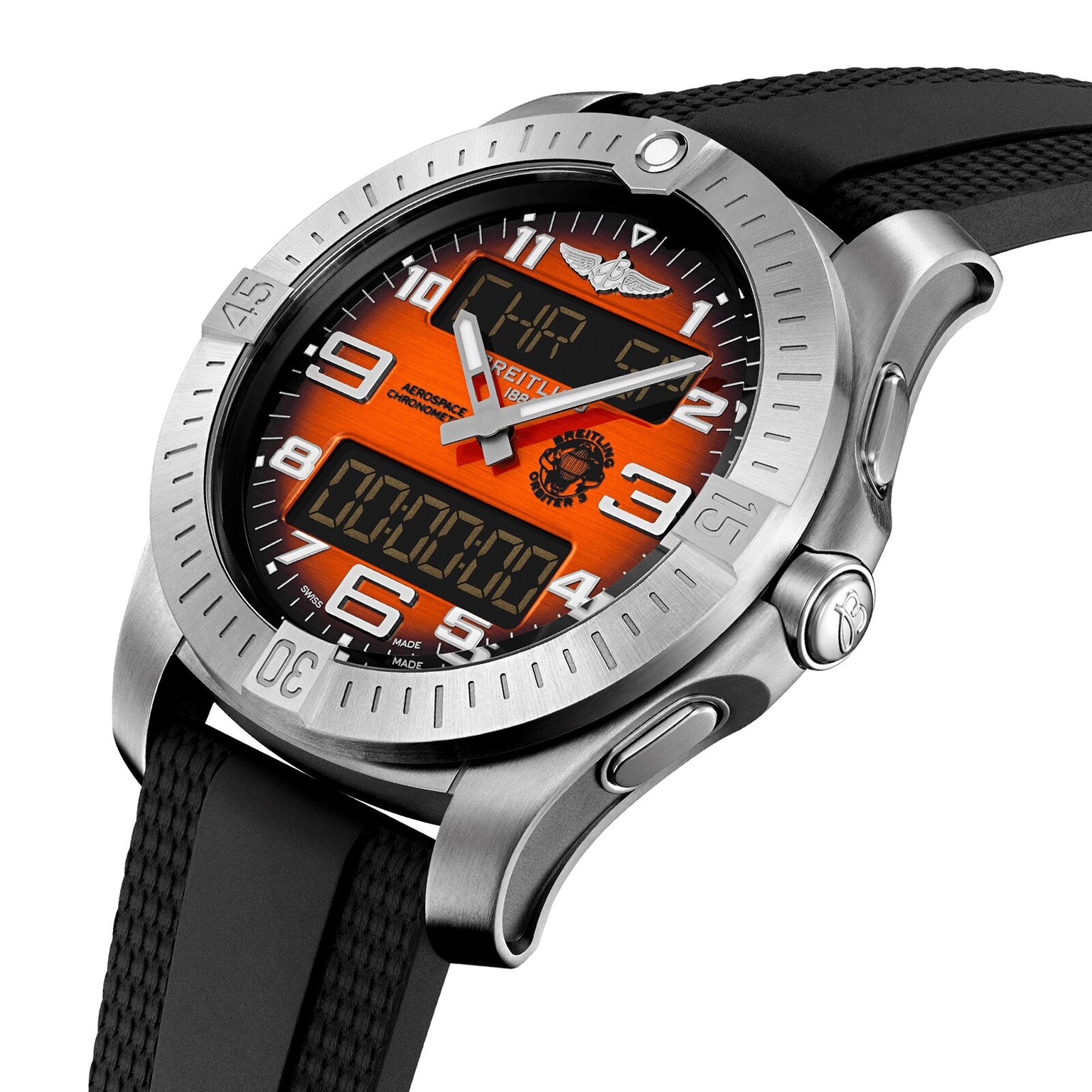 The Breitling Aerospace B70 Orbiter is a silver wristwatch with a textured black band, orange dial, white numerals, analog hands, digital displays, and engraved bezel—a multifunctional timepiece inspired by aviation heritage.
