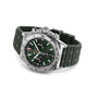 The Breitling Chronomat B01 42 is a stainless steel chronograph watch featuring a green dial with three black subdials and a matching textured green rubber strap.