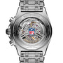 The back of the Breitling Chronomat B01 42 NFL Tennessee Titans Edition luxury watch features visible gears and an NFL logo on its transparent case.