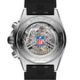 Close-up of the Breitling Chronomat B01 42 NFL New England Patriots Edition watch back, displaying intricate gears and the NFL logo at the center.