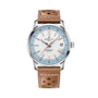 The Breitling Top Time B31 is a retro-inspired wristwatch with a white dial, brown leather strap, silver bezel, date window at 3 o’clock, and signature Breitling branding on the face.
