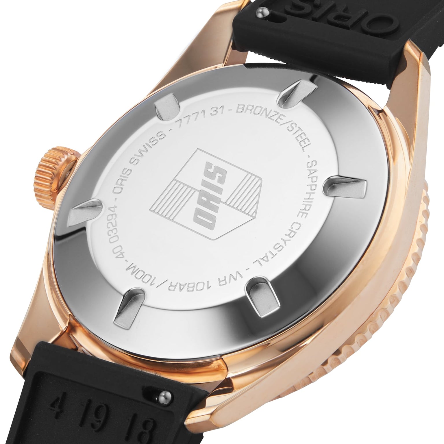 Close-up of the Oris Divers Sixty-Five Date wristwatch back engraved with brand and specs, showing a black strap and rose gold case.