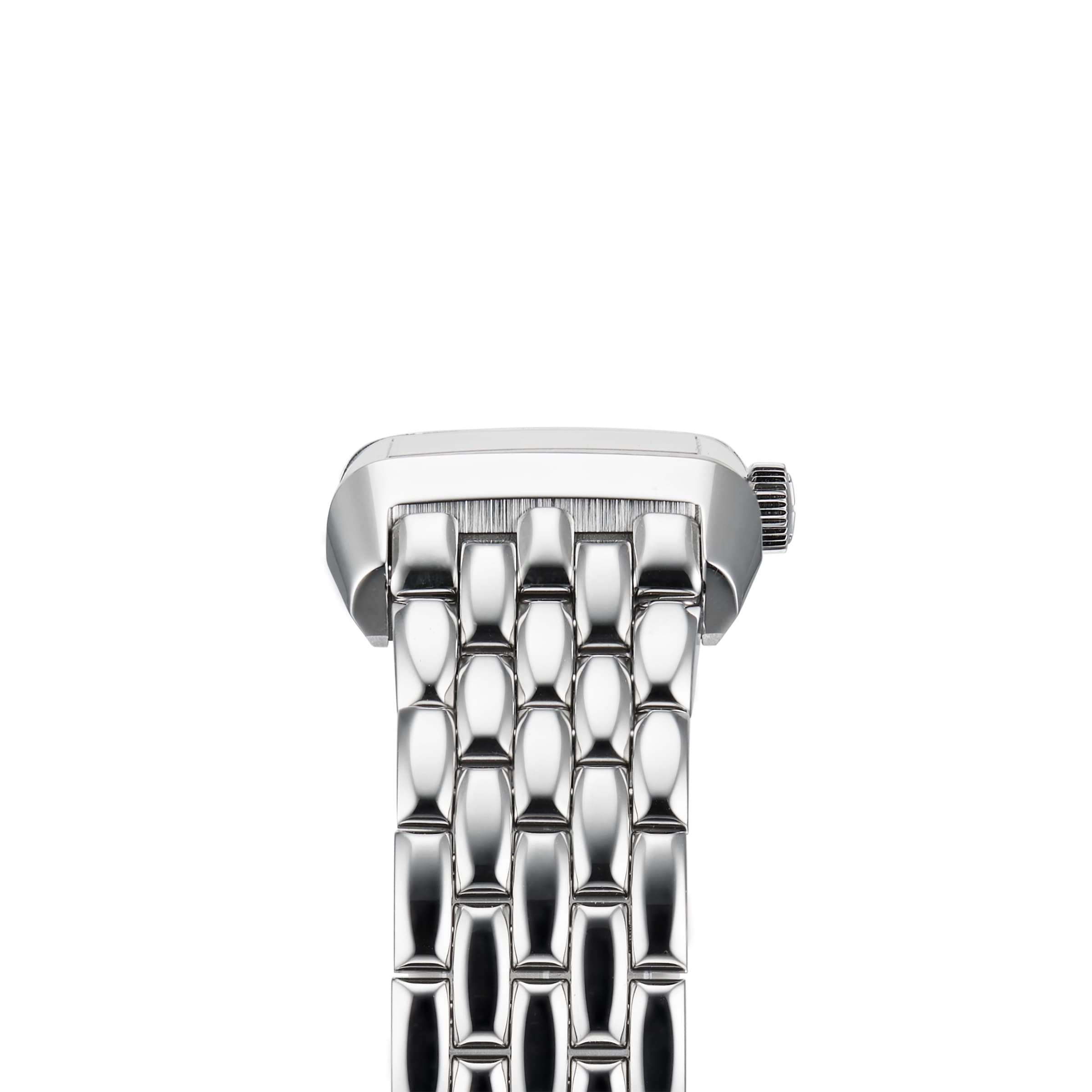 A side view shows the Jaeger-LeCoultre Reverso Classic ladies’ watch in silver metal with a shiny, textured link band, diamond bezel, and rectangular case against a white background.