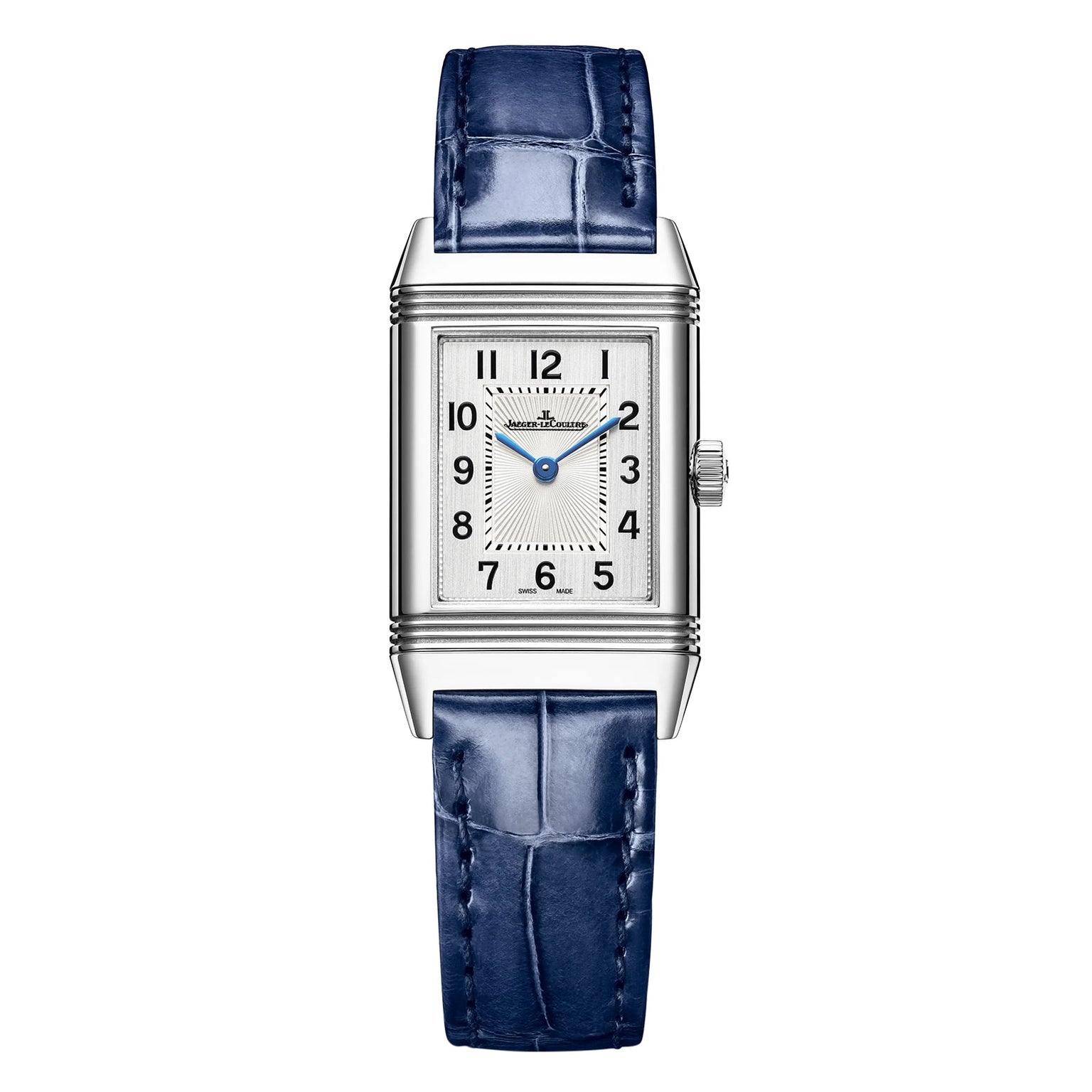 The Jaeger-LeCoultre Reverso Classic Small is a rectangular silver wristwatch with a blue leather strap, silver dial, black Arabic numerals, blue hands, art deco-style case lines, and a right-side crown.